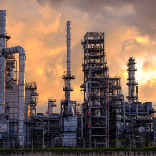 Oil,Industry,Refinery,Factory,,Petroleum,,Petrochemical,Plant,At,Sunset,Concept